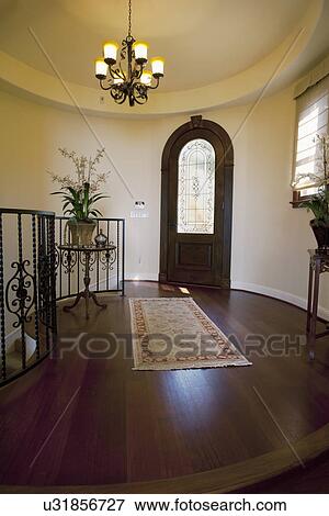Hardwood floors in foyer of traditional home, Laguna Beach, California, USA View Large Photo Image Stock Photo - Hardwood floors in foyer of traditional home, Laguna Beach, California, USA. Fotosearch