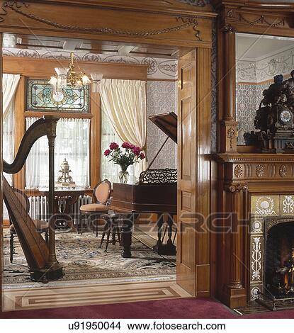 Harp and piano in music room of house View Large Photo Image Picture - Harp and piano in music room of house. Fotosearch