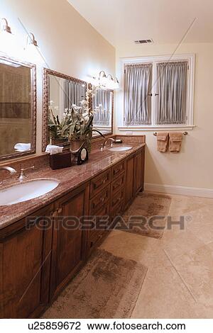 His and her sinks in contemporary bathroom; Laguna Beach; California; USA View Large Photo Image Stock Image - His and her sinks in contemporary bathroom; Laguna Beach; California; USA. Fotosearch
