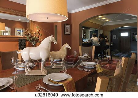 Stock Photo - Horse decorations on traditional dining table, Albuquerque, New Mexico, USA. Fotosearch
