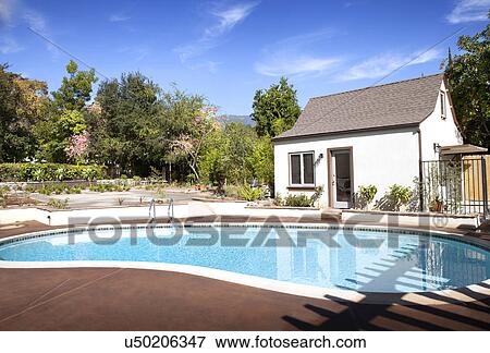 In ground pool in cottage backyard, Pasadena, California, USA View Large Photo Image Stock Photo - In ground pool in cottage backyard, Pasadena, California, USA. Fotosearch