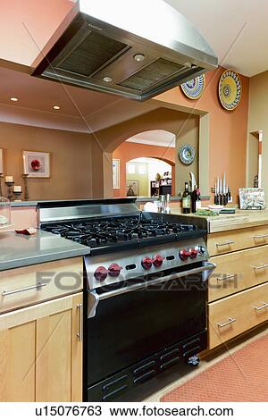 Stock Image - Industrial stove in contemporary kitchen, Santa Fe, New Mexico, USA. Fotosearch