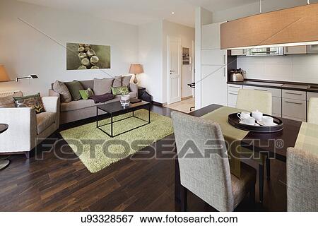 Interior of a contemporary living room with dining area View Large Photo Image Stock Photo - Interior of a contemporary living room with dining area. Fotosearch