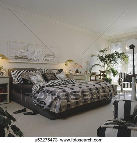 Stock Image - Interior of a master bedroom. Fotosearch