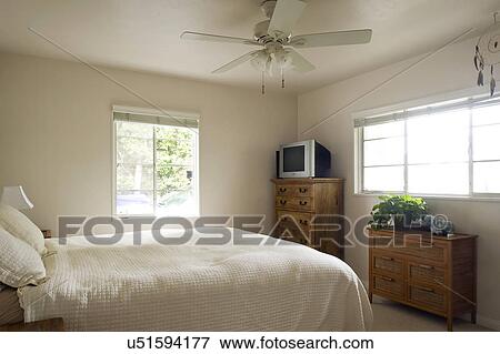 Stock Photo - Interior of a modern bedroom, San Diego, California, United States of America. Fotosearch