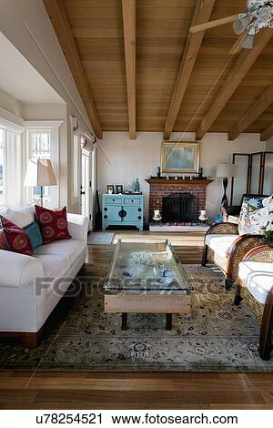 Interior of a traditional living room with wooden ceiling, Laguna Beach, California, USA View Large Photo Image Stock Image - Interior of a traditional living room with wooden ceiling, Laguna Beach, California, USA. Fotosearch