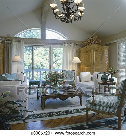 Interior of a traditional living room View Large Photo Image Stock Photo - Interior of a traditional living room. Fotosearch