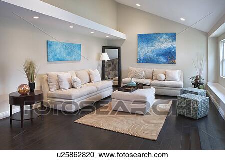 Stock Image - Interior of living room with comfortable sofas, California, USA. Fotosearch