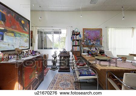 Interior of messy home office View Large Photo Image Stock Photograph - Interior of messy home office. Fotosearch