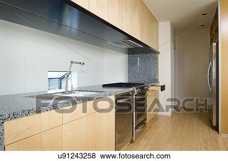 Stock Photo - Interior of modern kitchen with hardwood floor, San Diego, California, USA. Fotosearch