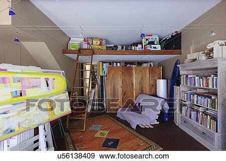 Interior of room with ladder, seat and shelves View Large Photo Image Stock Photo - Interior of room with ladder, seat and shelves. Fotosearch