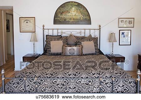 Stock Photo - Interior of tidy bedroom, California, USA. Fotosearch