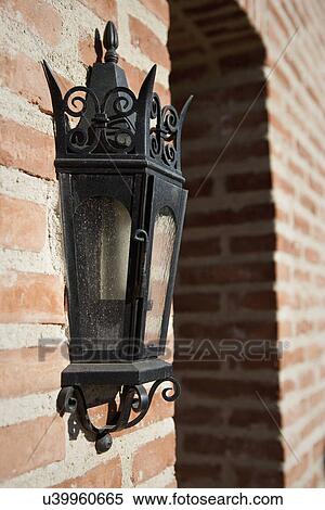 Italianate lantern style sconce on brick wall; Irvine; California; USA View Large Photo Image Stock Photography - Italianate lantern style sconce on brick wall; Irvine; California; USA. Fotosearch