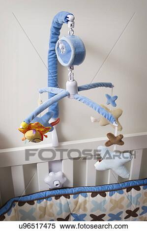 Stock Photography - Kid's mobile above crib, San Diego, California, USA. Fotosearch