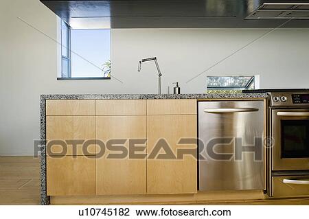 Stock Image - Kitchen in modern home, San Diego, California, USA. Fotosearch