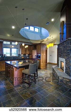 Kitchen island counter with dining counter stool; Loxahatchee; Florida; USA View Large Photo Image Stock Photograph - Kitchen island counter with dining counter stool; Loxahatchee; Florida; USA. Fotosearch