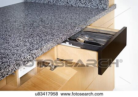 Kitchen outlet with drop down cover and silverware drawer View Large Photo Image Stock Photo - Kitchen outlet with drop down cover and silverware drawer. Fotosearch