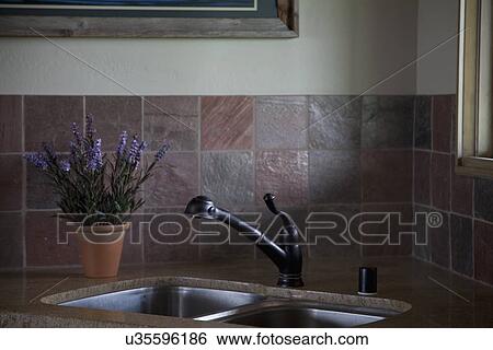 Kitchen sink with tile backsplash; Porterville; California; USA View Large Photo Image Stock Photograph - Kitchen sink with tile backsplash; Porterville; California; USA. Fotosearch