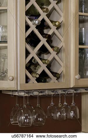 KITCHEN STORAGE DETAILS: wine glasses, and wine bottle storage View Large Photo Image Picture - KITCHEN STORAGE DETAILS: wine glasses, and wine bottle storage. Fotosearch