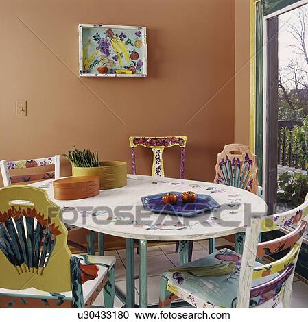 Kitchen with painted breakfast table and chairs, whimsical fun painted chairs and table, colorful and fun View Large Photo Image Stock Image - Kitchen with painted breakfast table and chairs, whimsical fun painted chairs and table, colorful and fun. Fotosearch