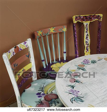 Kitchen with painted breakfast table and chairs, whimsical fun painted chairs and table, colorful and fun View Large Photo Image Stock Photo - Kitchen with painted breakfast table and chairs, whimsical fun painted chairs and table, colorful and fun. Fotosearch