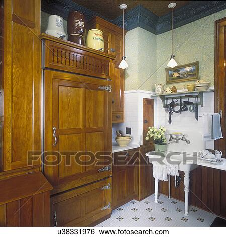 Kitchens Historically Correct Remodeled Victorian Kitchen Corner Area White Sink And Tile Fridge And Dishwasher With Stained Fir Wood Panels Tin