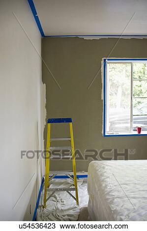 Ladder by bed covered with plastic in a half painted room, San Diego, California, United States of America View Large Photo Image Stock Image - Ladder by bed covered with plastic in a half painted room, San Diego, California, United States of America. Fotosearch