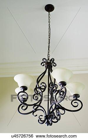 Lamp chandelier hanging on ceiling View Large Photo Image Stock Photograph - Lamp chandelier hanging on ceiling. Fotosearch