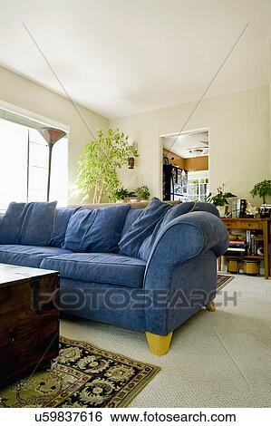 Large blue sofa in a living room, San Diego, California, United States of America View Large Photo Image Stock Photograph - Large blue sofa in a living room, San Diego, California, United States of America. Fotosearch