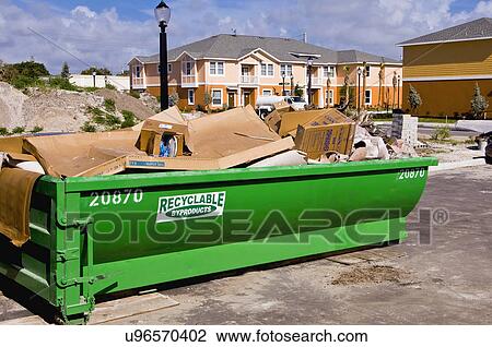 Large recycling bin outside housing community View Large Photo Image Stock Image - Large recycling bin outside housing community. Fotosearch
