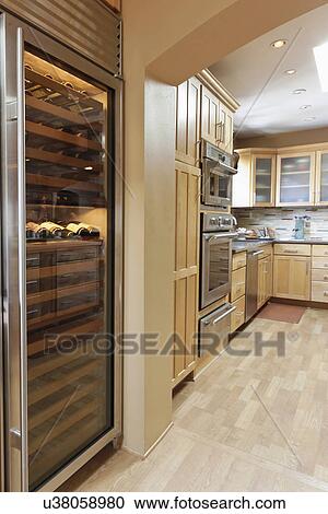 Large wine cooler in contemporary kitchen, Albuquerque, New Mexico, USA View Large Photo Image Stock Image - Large wine cooler in contemporary kitchen, Albuquerque, New Mexico, USA. Fotosearch