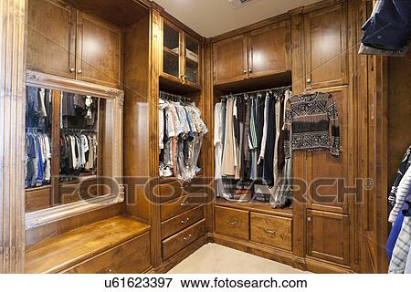 Large wooden walk in closet, Laguna Beach, California, USA View Large Photo Image Stock Photo - Large wooden walk in closet, Laguna Beach, California, USA. Fotosearch
