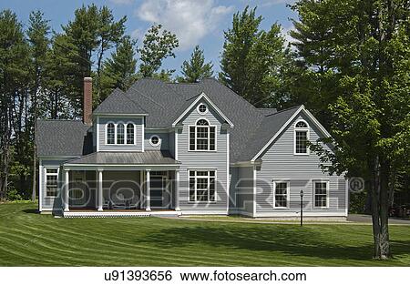 Stock Photograph - Lawn in front of single family home. Fotosearch