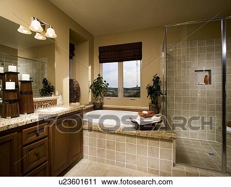 Stock Image - Light colored tile bathroom; Aliso Viejo; California; USA. Fotosearch