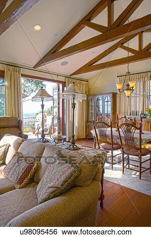 Living room and dining area in traditional home, Laguna Beach, California, USA View Large Photo Image Stock Photograph - Living room and dining area in traditional home, Laguna Beach, California, USA. Fotosearch
