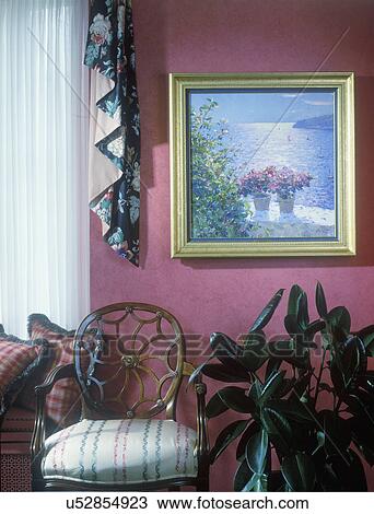 LIVING ROOM DETAIL - red painted wall, floral window treatment with full length sheers, antique chair with upholstered seat, gold framed oil painting. View Large Photo Image Stock Image - LIVING ROOM DETAIL - red painted wall, floral window treatment with full length sheers, antique chair with upholstered seat, gold framed oil painting.. Fotosearch