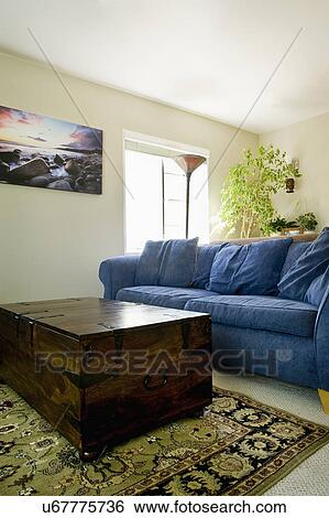 Living room with sofa and coffee table View Large Photo Image Stock Photograph - Living room with sofa and coffee table. Fotosearch