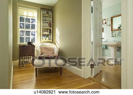 Long armchair on hardwood floor in traditional clean home View Large Photo Image Stock Image - Long armchair on hardwood floor in traditional clean home. Fotosearch