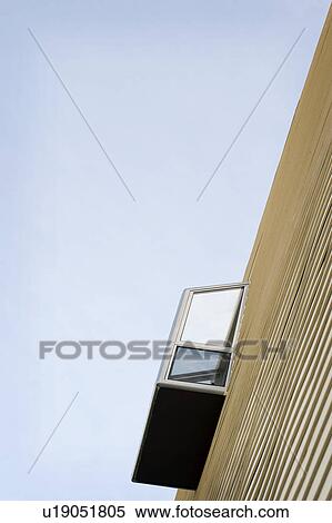 Stock Photography - Low angle view of modern bay windows on side of home, San Diego, California, USA. Fotosearch