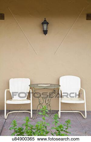Metal lawn chairs on patio; Bakersfield; California; USA View Large Photo Image Stock Photography - Metal lawn chairs on patio; Bakersfield; California; USA. Fotosearch