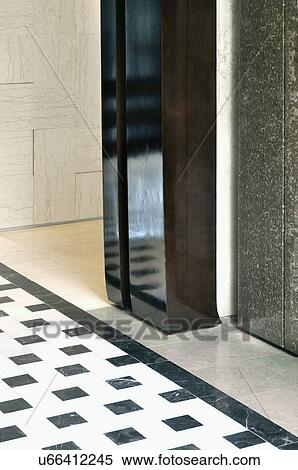 Stock Photography - Mosaic tile on hallway floor. Fotosearch