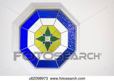 Stock Image - Octagonal stained glass window; Cardiff by the Sea; California; USA. Fotosearch