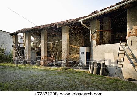 Old damaged residential structure, Albiano d'Ivrea, Italy View Large Photo Image Stock Photo - Old damaged residential structure, Albiano d'Ivrea, Italy. Fotosearch