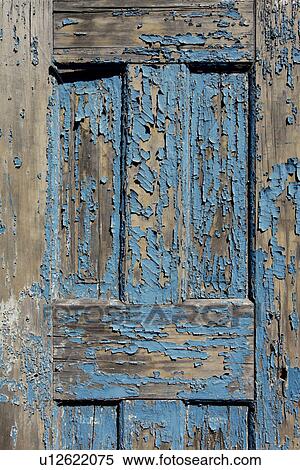 Stock Photography - Old weathered door with peeling blue paint, USA, New Mexico, Santa Fe. Fotosearch