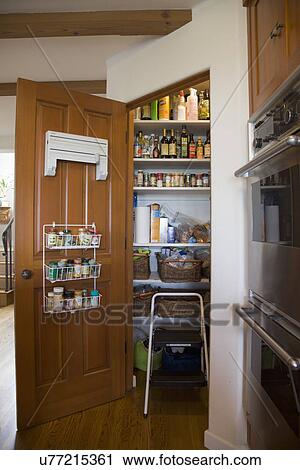 Open door to pantry in kitchen; Carpinteria; California; USA View Large Photo Image Stock Image - Open door to pantry in kitchen; Carpinteria; California; USA. Fotosearch