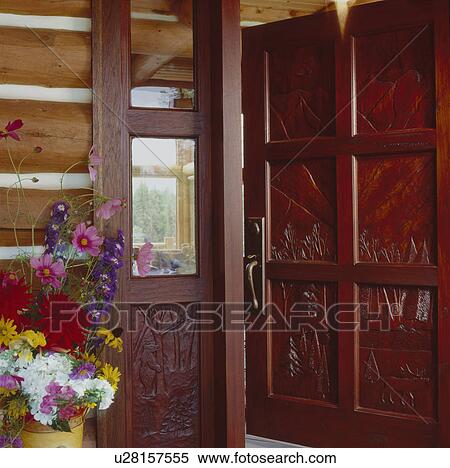 Open wooden door and flower vase View Large Photo Image Stock Photography - Open wooden door and flower vase. Fotosearch