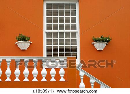 Orange painted house with window and railing, Cape Town, South Africa View Large Photo Image Stock Photo - Orange painted house with window and railing, Cape Town, South Africa. Fotosearch