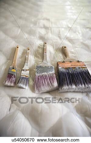 Paint brushes arranged on mattress View Large Photo Image Stock Image - Paint brushes arranged on mattress. Fotosearch