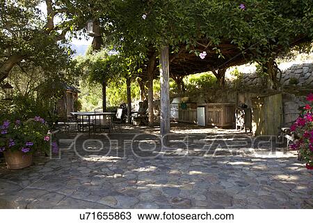 Stock Image - Patio at backyard of house, California, USA. Fotosearch