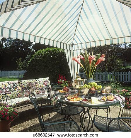 PATIOS: Detail of table and food. Gazebo tent. View Large Photo Image Stock Photo - PATIOS: Detail of table and food. Gazebo tent.. Fotosearch